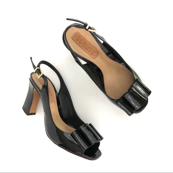 black heels with bow on back